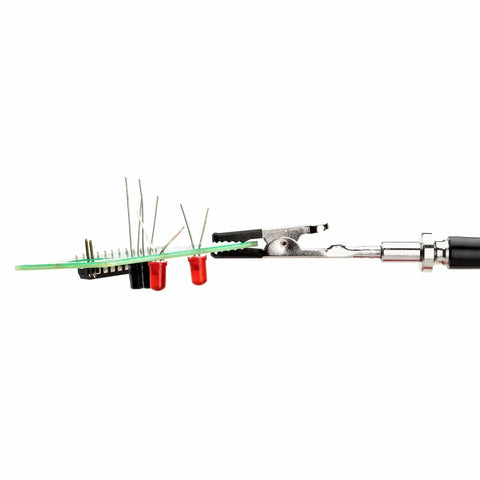 Helping Hands With Four Magnetic Gooseneck Arms, Adjustable And Flexible, Clamps Secure To Base, aiding PCB assembly with precision.