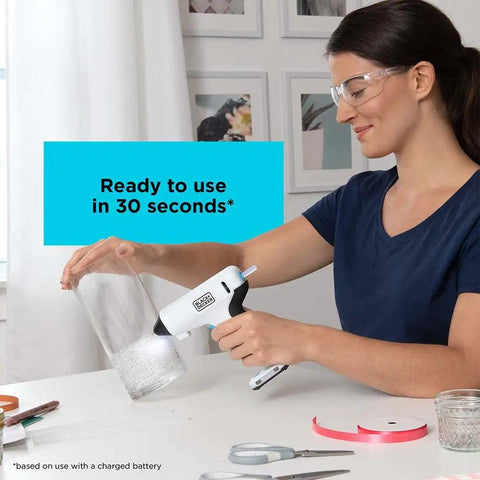 Woman using 4V MAX Cordless Glue Gun USB Rechargeable Quick Heat Up in 30 Seconds Stand Up Base Comfort Grip for a craft project