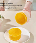 Game Changer Countertop Ice Maker Machine delivers fast crushed ice in just 2 seconds for slushies, showing ice box mold and yellow ice.