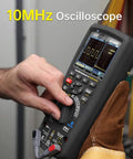 Person using Handheld Digital Oscilloscope Multimeter 3 In 1 With Bluetooth Interface 50 000 Counts 10MHz Oscilloscope 0.025 Percent DCV Accuracy 3.5 Inch Color LCD Display Real Time 50ms Sampling Motor Winding And Low Ohm Test.