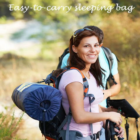 Woman carrying Double Sleeping Bag For Two With 2 Pillows, Queen Size XL For Two Adults, 3 Season Warm Cold Weather Comfort