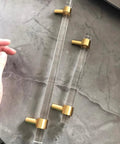 Adjustable Acrylic And Brass Cabinet Pulls With Center To Center Range 0 To 6 Point 2 Inches Four Piece Set in gold and clear finish