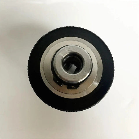 Heavy Duty 63Mm K02-63 Four Jaw Scroll Chuck For Mini Wood Lathe With Hardened Steel Jaws And M14 Mount Thread Precision Manual Clamping Tool top view showing steel jaws and black casing.