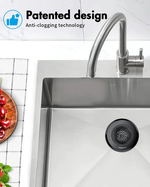 Zero Hassle Kitchen Sink Drain Strainer Featuring A Patent Flip Bottom Design And Sleek Black Chain Mesh Basket in stainless steel sink.