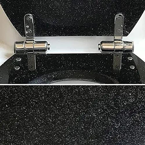 Thick Molded Resin Toilet Seat With Silent Slow Close Lids Hella Comfy Ergonomic Curve Built Like A Tank Easy Peasy To Clean A Real Game Changer For Your Restroom Setup showing detailed toilet seat hinges and glitter surface.