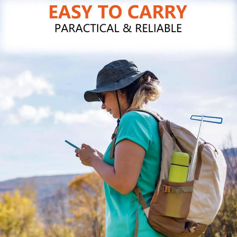 Person with backpack carrying 16 Foot Telescopic Stainless Steel Disc Golf Retriever Pole With Hooks And Suction Cup in outdoor setting.