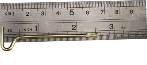 Top Shelf Emergency Key Kit For Interior Door Locks With Kwikset Schlage Includes Twelve Heavy Duty Brass Tools showing a brass tool on a ruler for size reference.