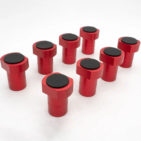 8 Pack 3/4 Inch Lightweight Aluminum Bench Dogs Non Slip Woodworking Clamp Set For Dog Holes Red Heavy Duty Non Skid Workbench Stoppers angled view showcasing rubber-topped design.