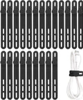 25 Pack Reusable Silicone Cable Ties Ultra Flexible Cord Wraps For Electrical Cords Phone Chargers Earphones And USB Cables No Scratch High Elasticity Up To 36cm Black, arranged in rows with one showing a white tied cable.