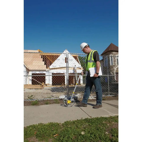 Rolatape RT312 12.5 Inch Aluminum Measuring Wheel Built To Last With Lightweight Durable Design For Landscaping And Construction, Ergonomic Pistol Grip, Yellow Great For Yards And Job Sites, used on a sidewalk
