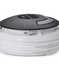 Electric Food Dehydrator With Four Stackable Trays And Top Mounted Fan compact design with folding lid for easy storage.