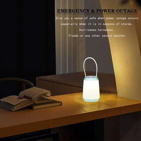 LED lamp on a desk with books, illustrating 3 Pack LED Camping Light With 3 Modes Battery Powered Night Light For Indoor And Outdoor Use