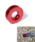 Red recovery ring and blue synthetic soft shackle rope in use with protective sleeve for off-road ATV UTV SUV truck marine