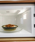 Microwave interior with food bowl, showing Mica Sheets For Microwave Oven Heat Resistant Insulation Plates 10 Pieces Mica Accessory For Kitchen Appliances Protect Against Food Debris For Reducing Mess And Spatter Extends Microwave Lifespan And Keeps Food From Debris For Daily Cooking And Reheating installed.