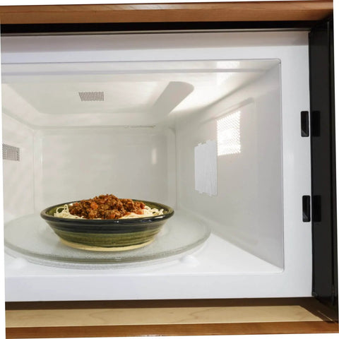 Microwave interior with food bowl, showing Mica Sheets For Microwave Oven Heat Resistant Insulation Plates 10 Pieces Mica Accessory For Kitchen Appliances Protect Against Food Debris For Reducing Mess And Spatter Extends Microwave Lifespan And Keeps Food From Debris For Daily Cooking And Reheating installed.