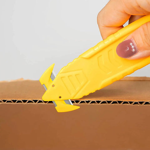 Hand using 50 Pack Safety Box Cutter With Double Sided Concealed Blade Stainless Steel Package Opener For Shipping And Mail