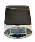Professional Grade Built Tough Digital Scale With Dead On 0.1G Accuracy LED Backlit Panel Stainless Steel Tray for precise measurements.