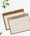 Nail Your 2026 to 2027 Game Plan With This 18 Month Wall Calendar Spanning August 2026 to December 2027 in Green With Premium Paper Twin Wire Binding and A Hanging Hook at 8.5 X 11 Inches to Keep You Squeaky Clean on Every Schedule, showing June and December months.