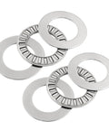 Front view of six stainless steel thrust needle roller bearing washers, 1.25 in outer diameter