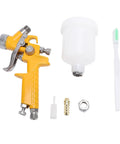 Rock Solid And Compact 125Ml Mini Spray Gun With Easy Turn Triple Knobs For Hella Smooth Paint Jobs On Cars Furniture And Walls Featuring A Precise 1Mm Nozzle Tip with yellow handle, nozzle, and cup.