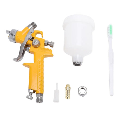 Rock Solid And Compact 125Ml Mini Spray Gun With Easy Turn Triple Knobs For Hella Smooth Paint Jobs On Cars Furniture And Walls Featuring A Precise 1Mm Nozzle Tip with yellow handle, nozzle, and cup.