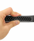 Hand holding Grind-To-Fit Recoil Pad For Rifles And Shotguns, Silicone Buttstock Pad In Black, Adds About Half An Inch To Length Of Pull