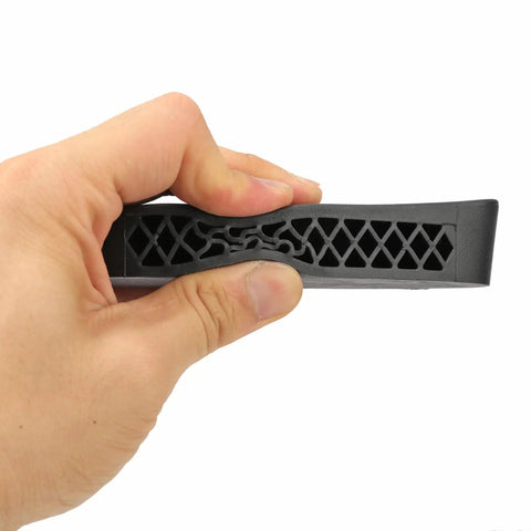 Hand holding Grind-To-Fit Recoil Pad For Rifles And Shotguns, Silicone Buttstock Pad In Black, Adds About Half An Inch To Length Of Pull