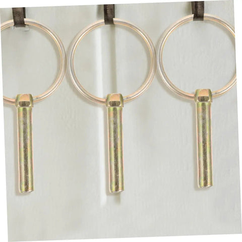 Close-up of clevis pins with hitch ring clips from the 12 Piece Heavy Duty Clevis Pin And Safety Pin Kit for secure fastening.