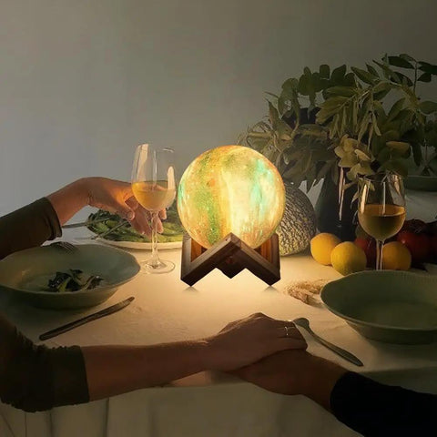 Galaxy Lamp With Wooden Stand 16 LED Color Changing Night Light on dining table, creating ambient lighting with wine glasses.