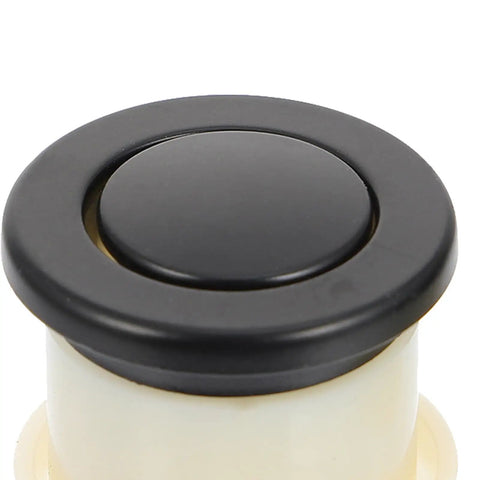 Super Sleek Four Pack Retractable Spring Loaded Cabinet Knobs, black zinc alloy knob top view, 30mm diameter, safe for kids and pets.