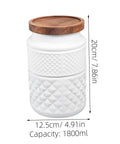 Two Pack Glass Storage Jars With Secure Airtight Lids For Coffee Beans And Dry Goods Keeps Your Stash Locked Down Tight, white jar with wooden lid.