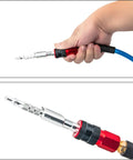 Close-up of hand holding Five Pack One Quarter Inch I M Type Plug Air Blow Guns, showing aluminum construction with adjustable PSI airflow.