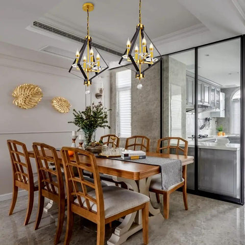 4 Light Lantern Chandelier In Black And Gold With A Dope Mid Century Geometric Square Cage Pendant Light above dining table