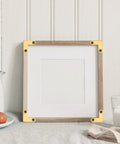 Upgrade Your DIY Builds With These 8 Piece Bronze L Shaped Corner Brackets built tough for rust resistance on a picture frame.