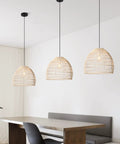 Room with Two Pack Woven Rattan Pendant Lights for Kitchen Island and Living Room, Minimalist Farmhouse Ceiling Chandeliers, cozy setting.
