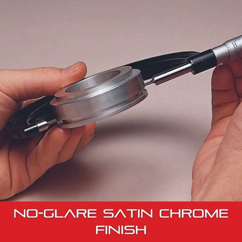 Hands holding an outside micrometer with advanced sleeve design and satin chrome finish, highlighting its no-glare feature.