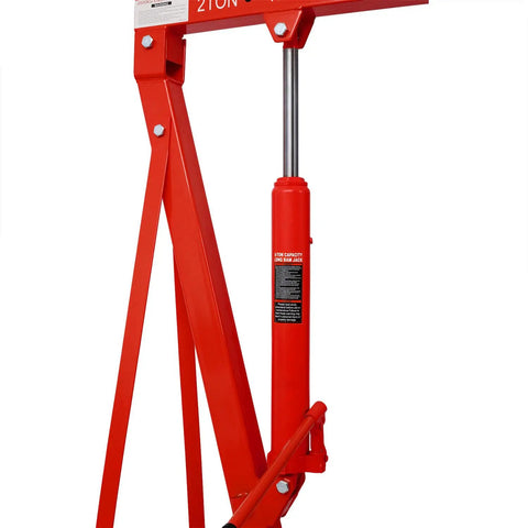 Foldable Hydraulic Engine Hoist And Cherry Picker With Six Heavy Duty Steel Casters 4400 LB Capacity Badass Workhorse Shop Crane For Garage Mechanics And Repair Red close-up of hydraulic lift mechanism and frame.