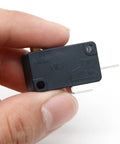 Person holding KW3 Snap Action Switch Normally Open 125V/250V Micro Limit Switch for Air Fryers, Microwaves, Vacuum Cleaners