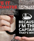 Person holding Because I'm The Captain Coffee Mug For Boat Lovers 11oz black ceramic cup with C handle, nautical sailor gift.