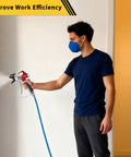 Man using Heavy Duty 3600 Psi Airless Primer Paint Spray Gun With Five Reversible Tips And Two Brass Guards for smooth coverage.