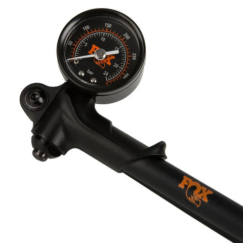Fox Factory HP shock pump close-up with gauge and swivel head, black body, orange Fox logo, 350 PSI