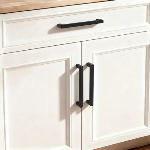 Solid Flat Black Square Cabinet Pulls, Built Tough Stainless Steel Drawer Handles on white kitchen cabinets.