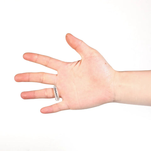 Ring Sizer Adjuster For Loose Rings Women 4 Sizes Invisible Plastic Ring Sizers With Polishing Cloth Pack Of 16 on a hand