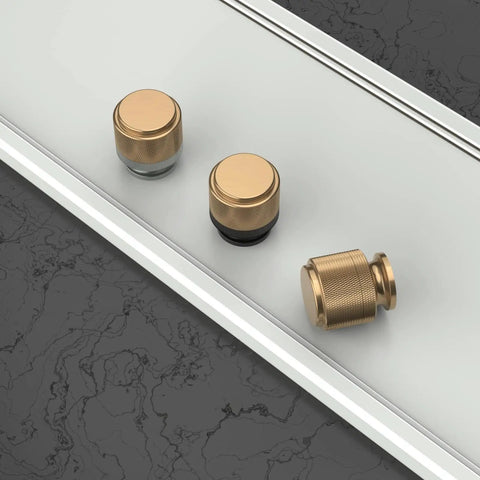 Top view of two pack matte black and champagne bronze knurled cabinet knobs for kitchen cabinets and dresser drawers zinc hardware