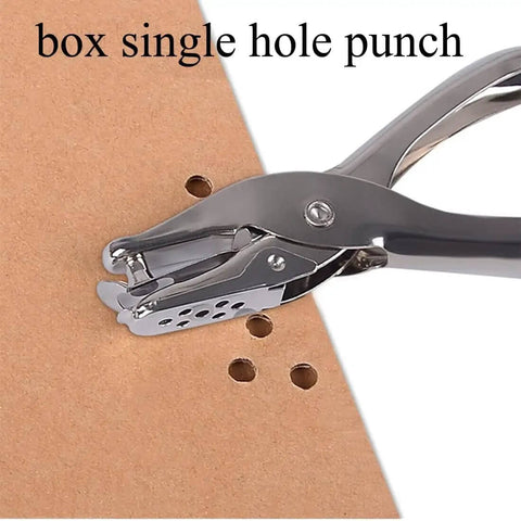 Durable 6mm metal hole punch for scrapbooking perforating cardboard, showing precise round holes.