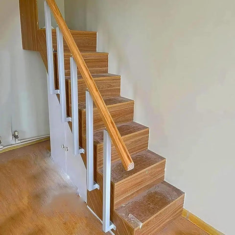 Pro Grade Adjustable Side Mount Railing Kit Featuring 270 Degree Flat Brackets And Square Iron Spindle Post on wooden stairs