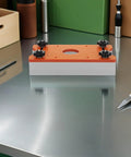 Tough Aluminum Router Table Insert Plate Dead Center Alignment Tight Grip Locks No Sweat Mounting For The Woodshop Crew, orange and white design.