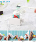 Two Pack Minimalist Toothpaste Tube Squeezers Roller Tool For Easy Mess Free Squeezing Eco Friendly White Dispenser in use