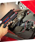 Heavy Duty Car Power Inverter With Led Digital Display And Us Plug For Vehicle And Home Use Aluminum Alloy Shell shown holding in engine bay.