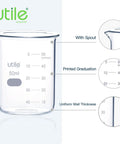 Close-up of Utile 50ml Beaker Shot Glass, showing spout, printed graduations, and uniform wall. 50ml Beaker Shot Glass Set Low Form Borosilicate 3 Point 3 Glass With Double Scale Graduation 10 Piece Laboratory Barware For Precise Mixing Perfect For Lab And Party Use.